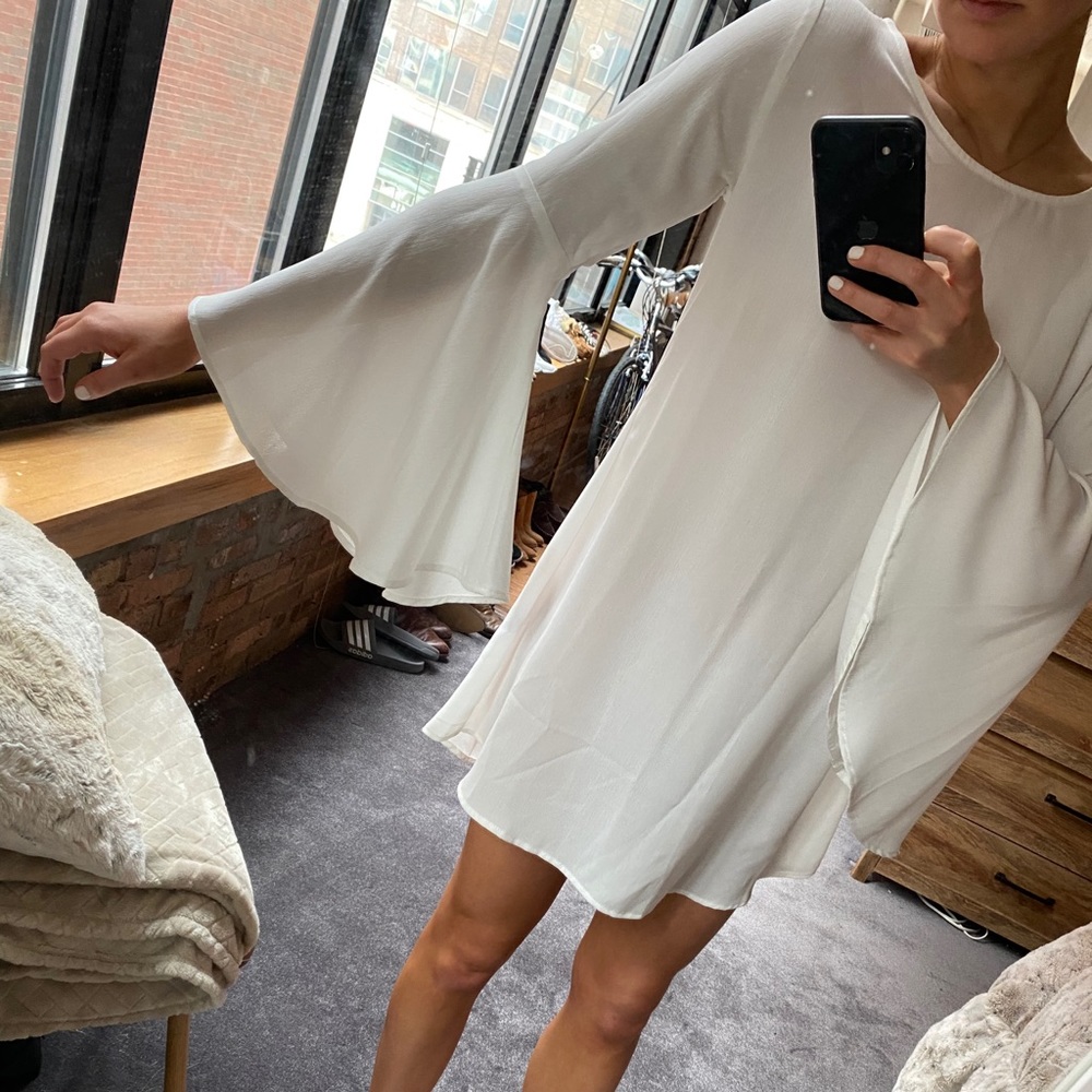 Boutique white flowy mini dress